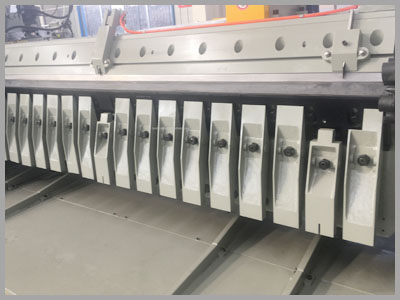 peeling machine blade presser
